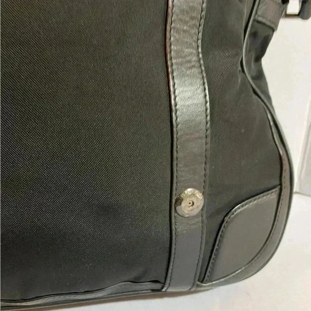 Burberry  Unsex nylon leather trimmed messenger bag
